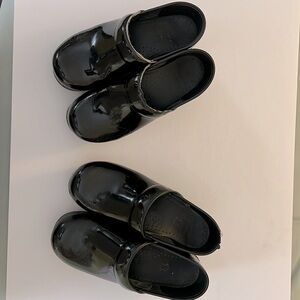 2 pair of Dansko Clogs sizes 36 and 37.